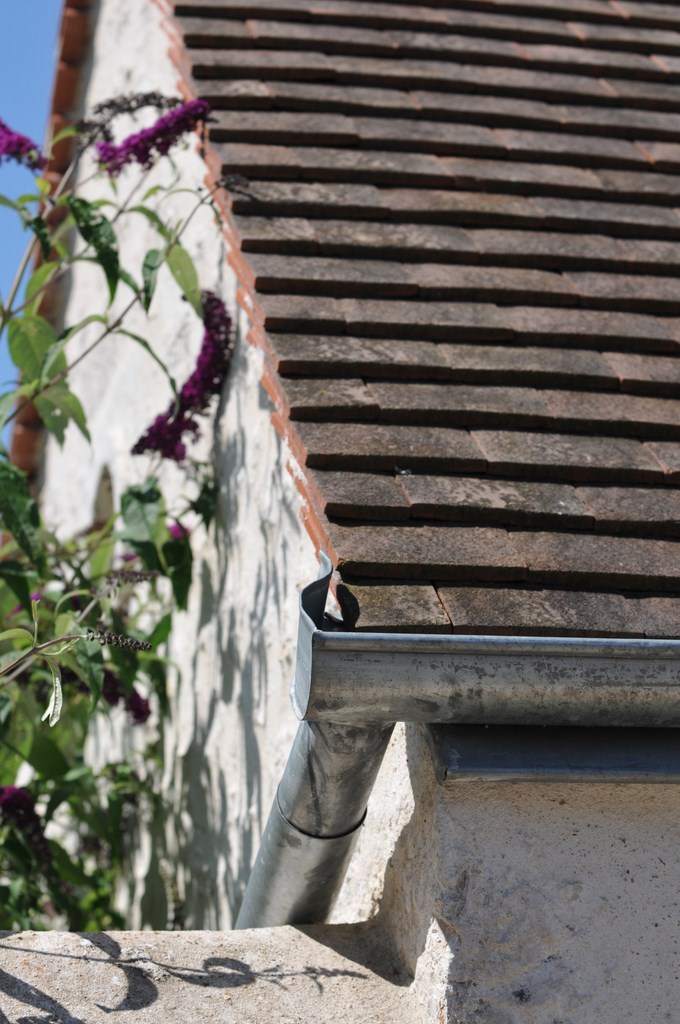 Extension de maison - création complète charpente et couverture en tuiles plates - enduits de façade à la chaux