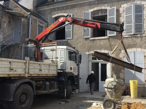 Percement dans un mur porteur en béton armé avec mise en place d'un linteau profilé HEA