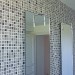 Aménagement d'une salle de bains - Réalisation d'une douche à l'italienne et pose de carrelage (mosaïque murs et douche)